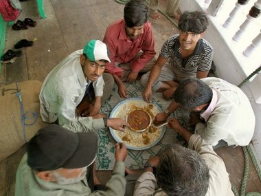 Indian migrant workers in Dubai are often treated "like slaves"