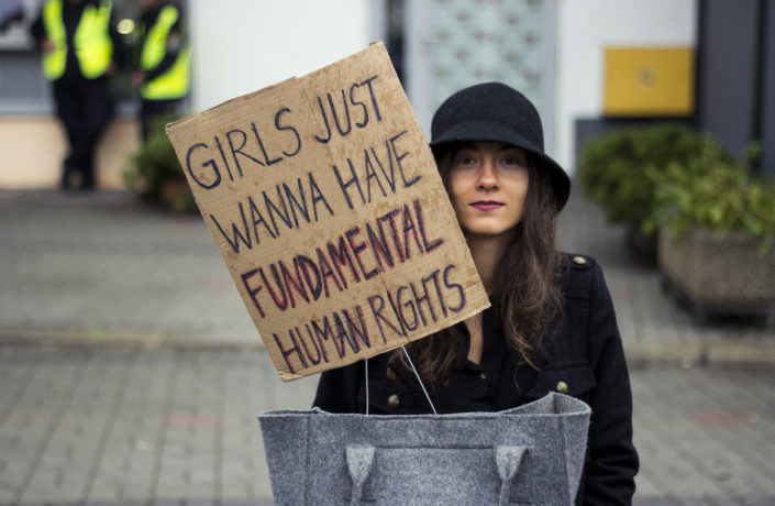 "Girls just wanna have fundamental human rights" sign at protest against anti-abortion laws in Poland